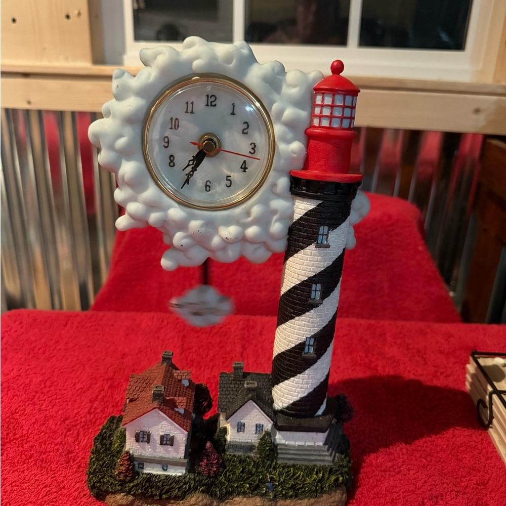 Lighthouse Pendulum Clock with Red and Black Accents